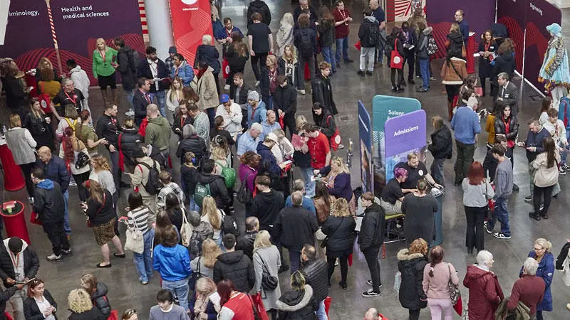 A crowd of people in the Spark atrium attending a Solent open day