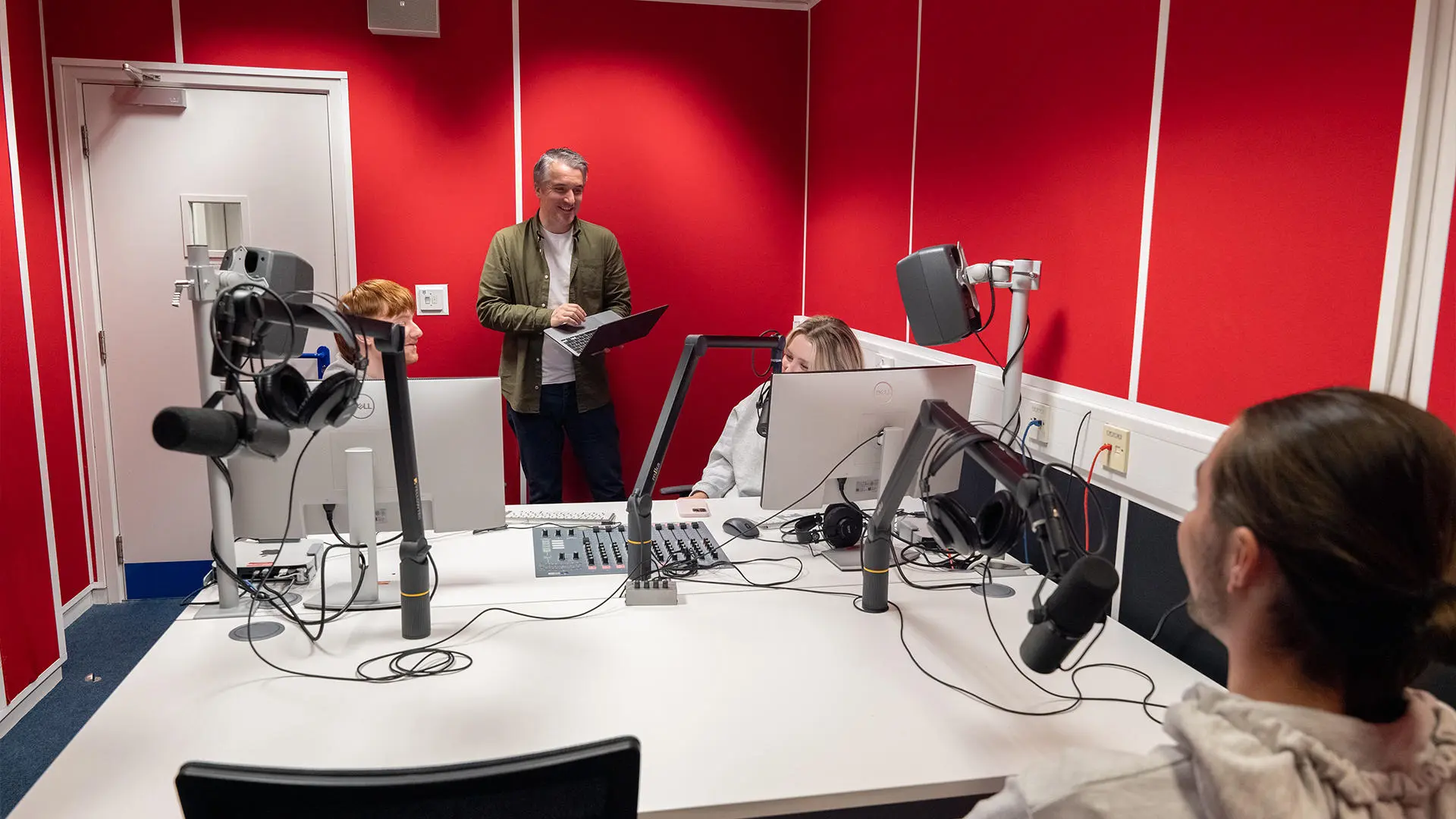 Students working in radio studio