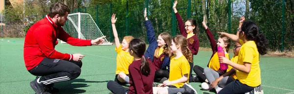 A Solent sport student working with school children